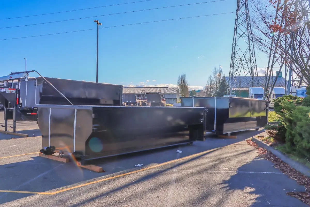 Roll-off dumpster ready for waste disposal at job site for 3 Yard Dumpster Rental in Tyrone